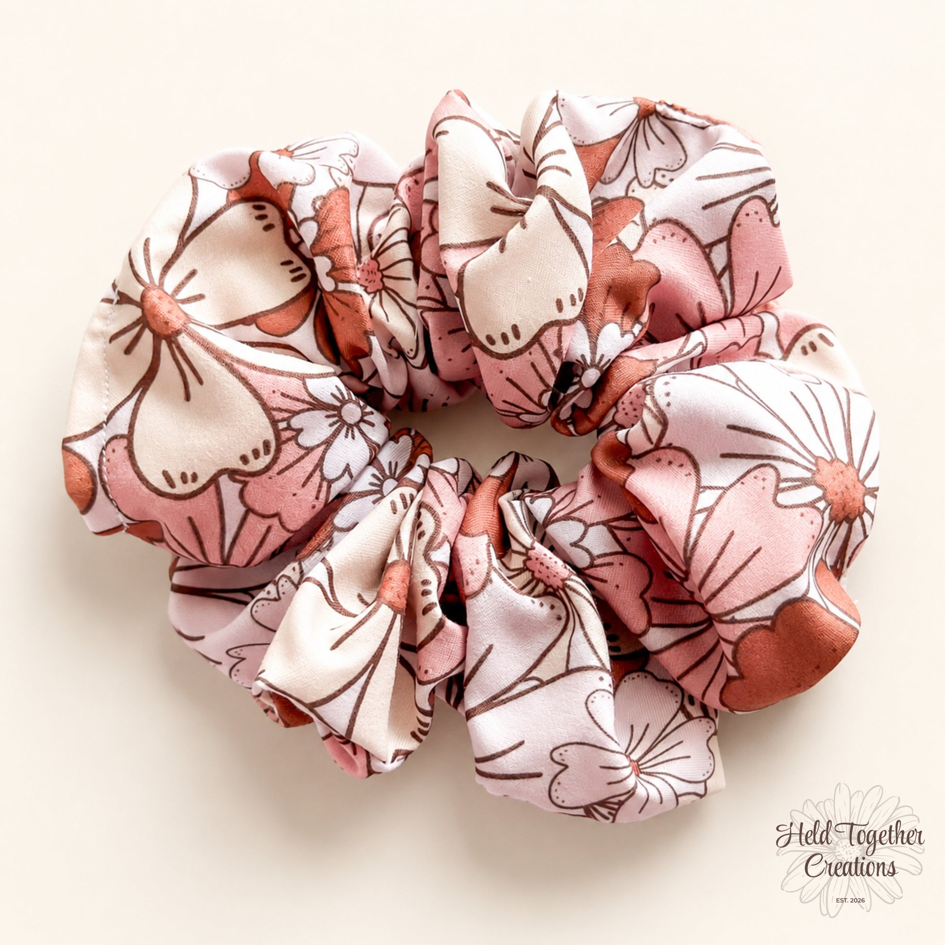 Handmade floral scrunchie in blush, cream and peach tones. A soft everyday hair accessory and sweet little gift under $10.