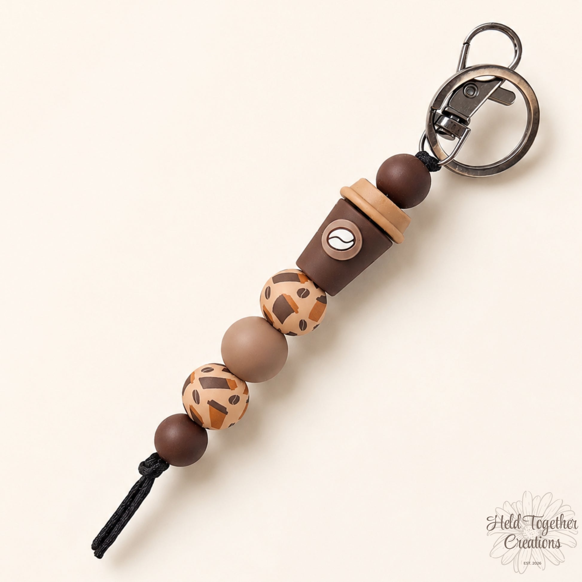 Handmade coffee lover silicone bead keyrings in Coffee Cup and Coffee Bean styles with brown, mocha, cream and latte-toned beads.
