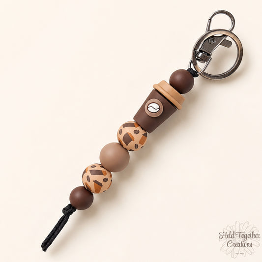 Handmade coffee lover silicone bead keyrings in Coffee Cup and Coffee Bean styles with brown, mocha, cream and latte-toned beads.
