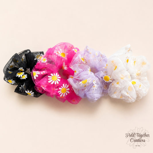 Daisy puff scrunchies.