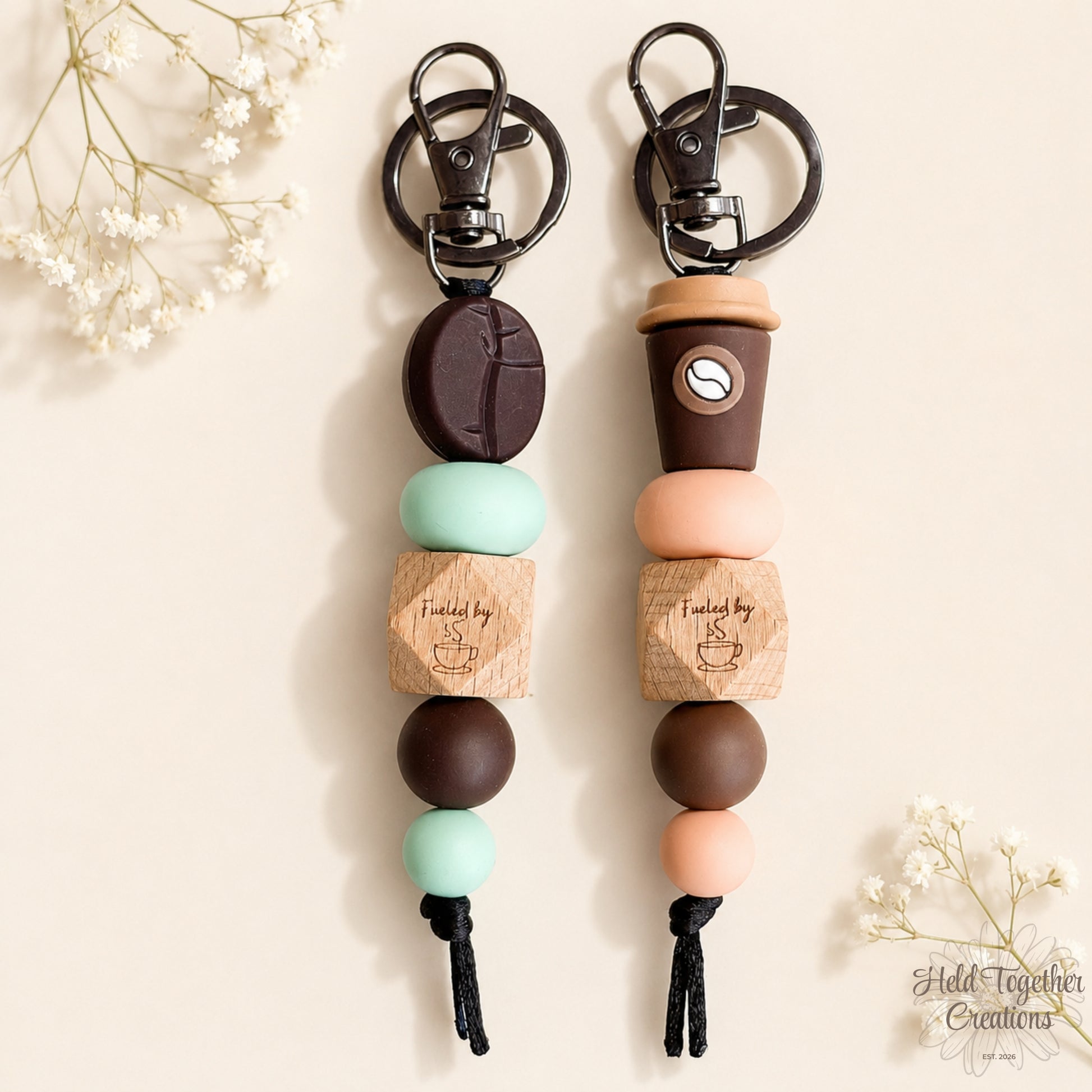 Handmade fuelled by coffee silicone bead keyrings with coffee-inspired beads, timber coffee cup bead and metal keyring hardware.