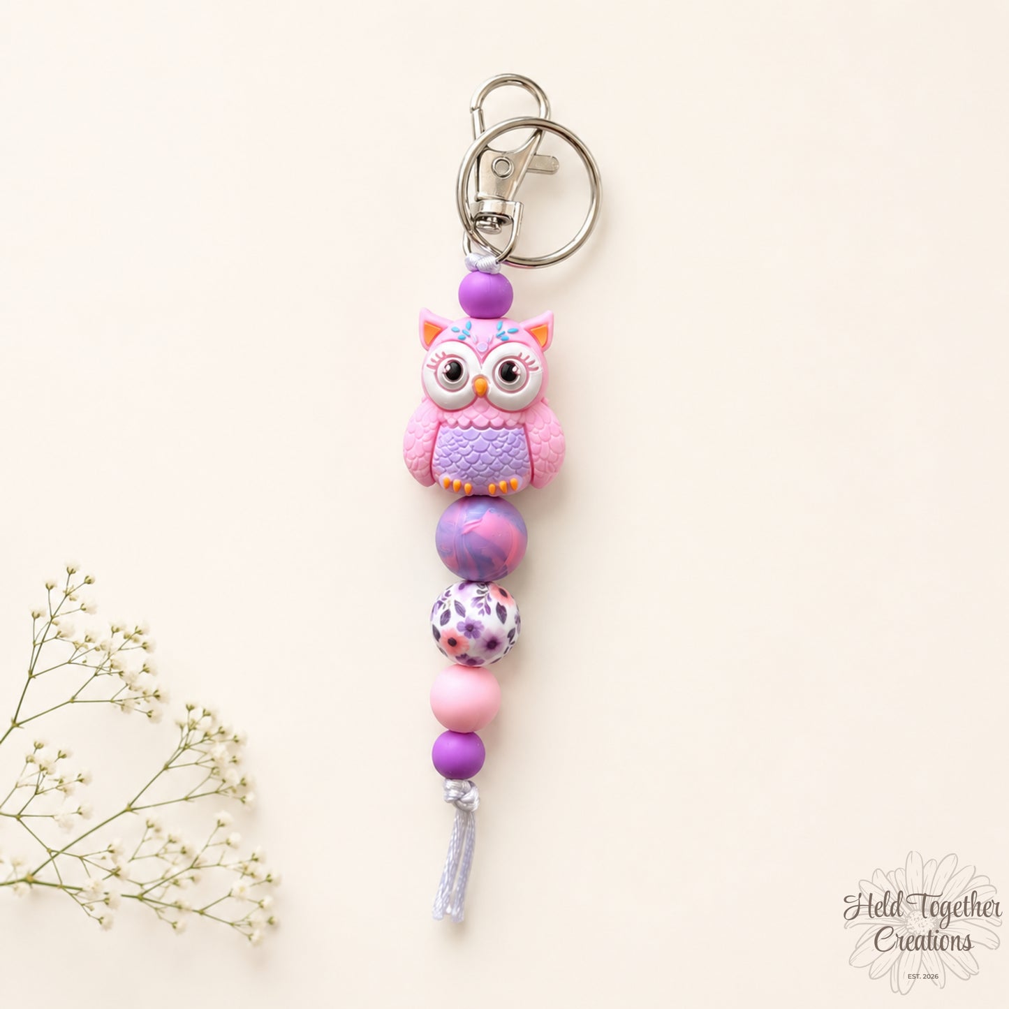 Purple owl silicone bead keyrings with pink, purple and patterned beads on silver keyring hardware.