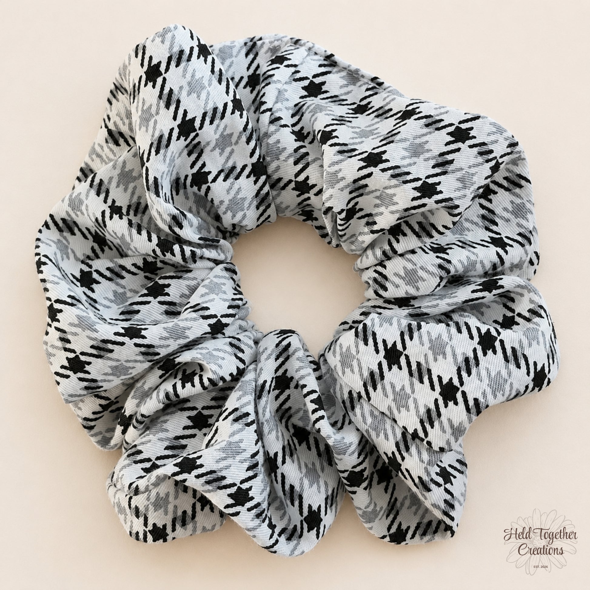 Urban Ash Scrunchie flat lay showing black, grey and pale blue checked-style fabric pattern.